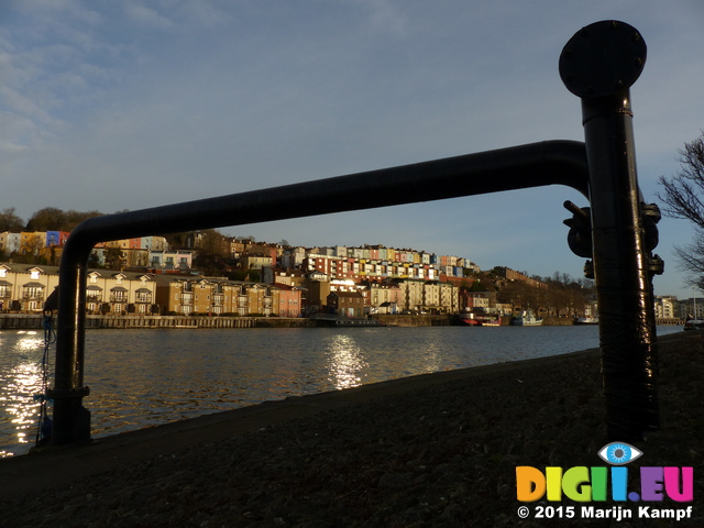 FZ011599 Colourful houses seen through pipes from Floating Harbour, Bristol